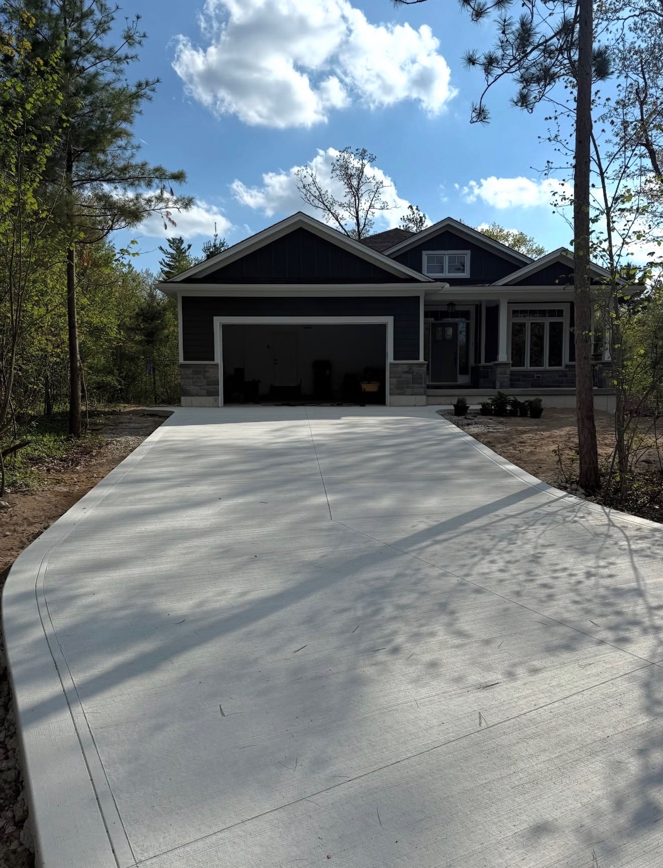 Finished broom-finished residential concrete driveway